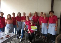 Ehrenamtliche Frauen des Rathaus-Cafés Merxheim mit der Nominierungsurkunde zum Deutschen Nachbarschaftspreis 2026